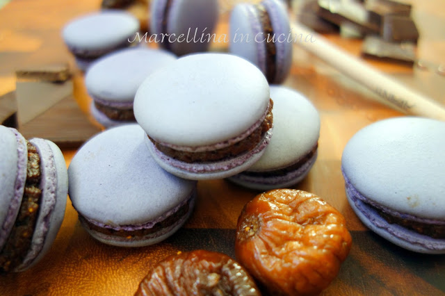 Macarons in a pile on the table.