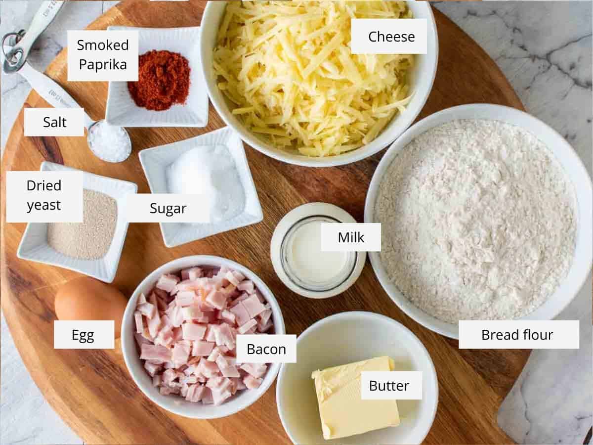This savoury Cheese Bread with Bacon is beautiful to look at and super tasty to eat. The dough is enriched with butter and egg then rolled up with cheese and bacon. You won't be able to stop eating this one! #bread #cheesebread #bakingwithyeast #bake Ingredients for this recipe as in the recipe card.
