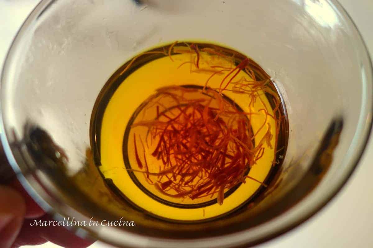 Saffron threads steeping.