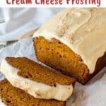 Pumpkin Bread with Cream Cheese Frosting with two slices cut.