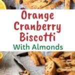 Orange Cranberry Biscotti on white paper with halved oranges and dried cranberries scattered viewed from above.
