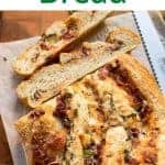Swirled topping Bread with two slices cut with text above.