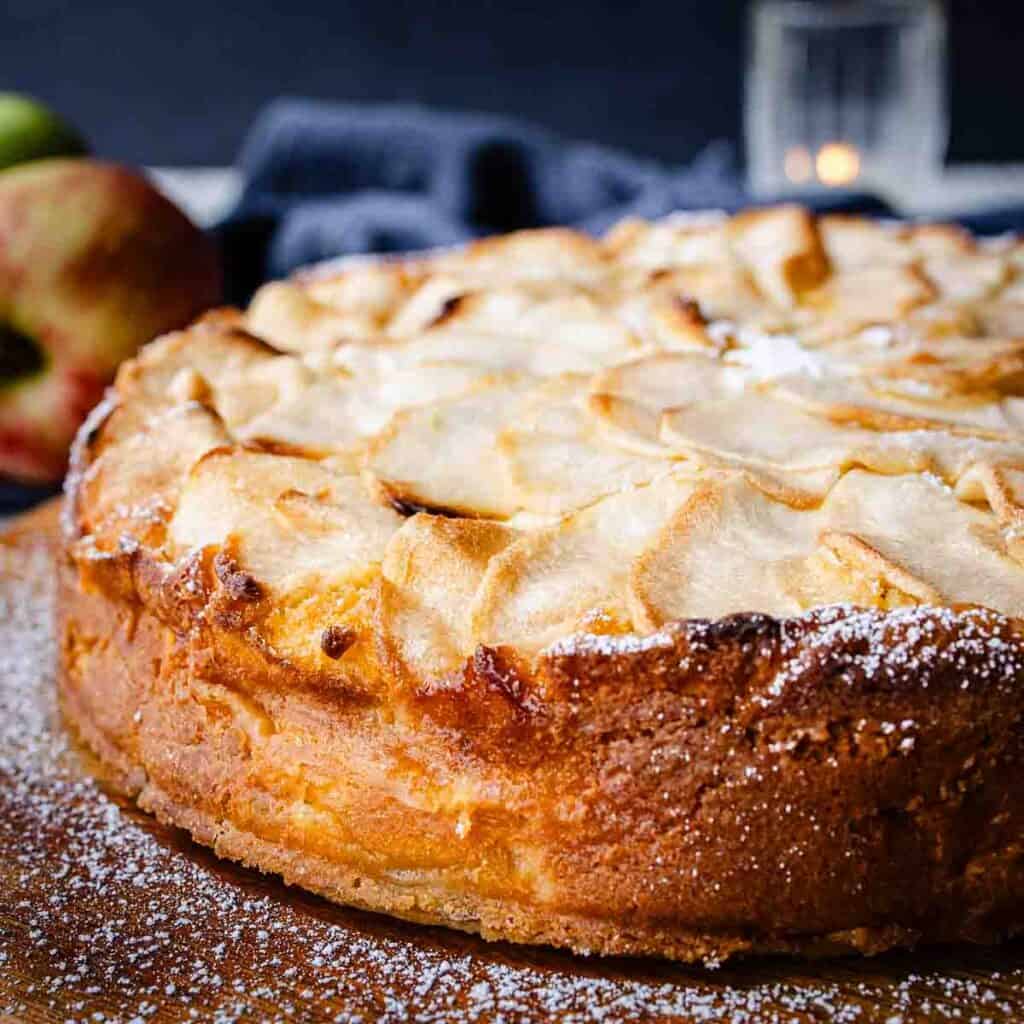 Italian Apple cake on a wooden board.