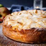 Italian Apple cake on a wooden board.