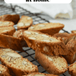 Almond biscotti on black wire rack