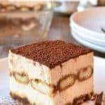 square slice of tiramisu on white plate