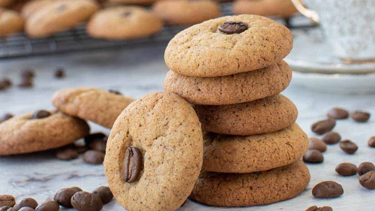 Cookies stacked with one cookie leaning on the stack.