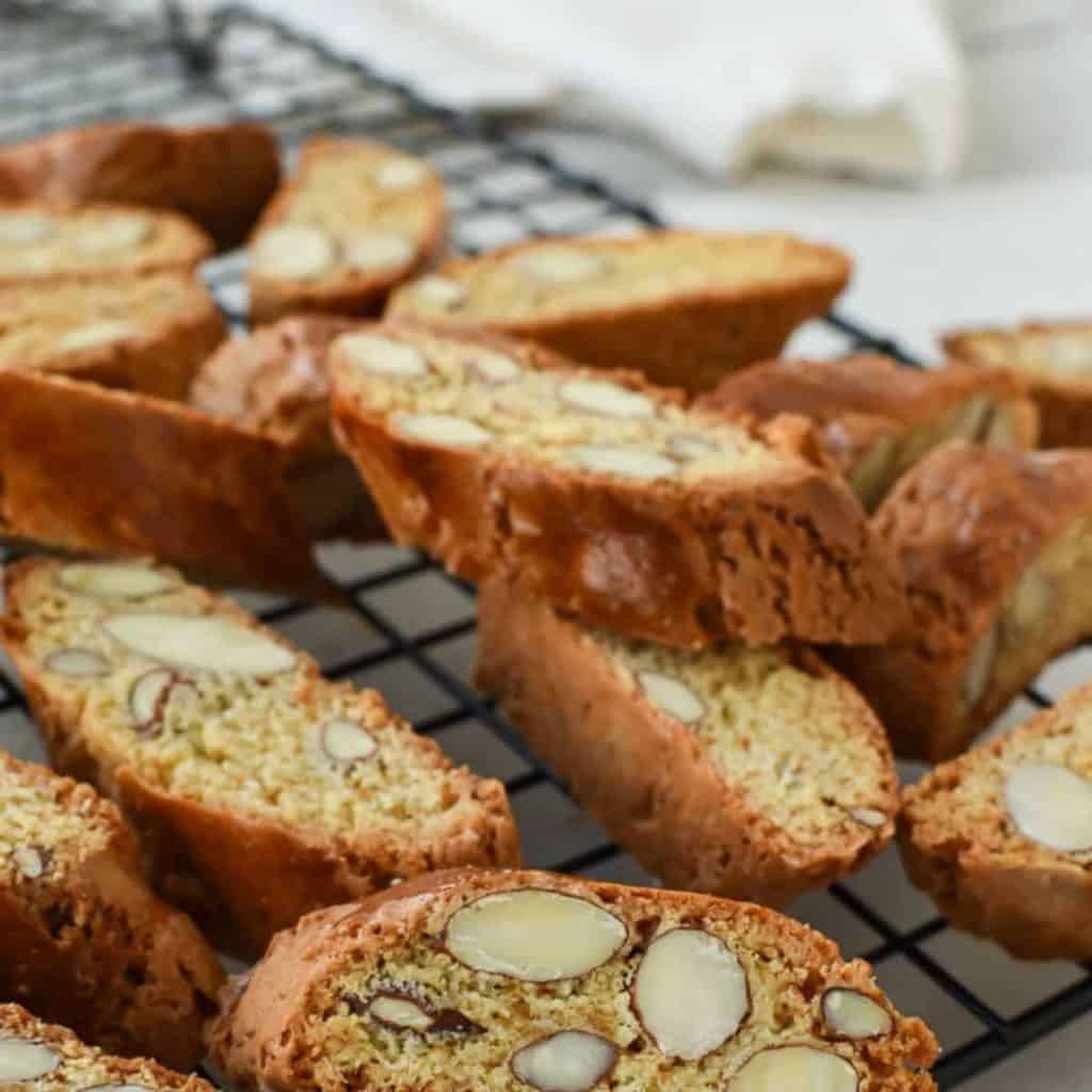 Almond biscotti on black wire rack