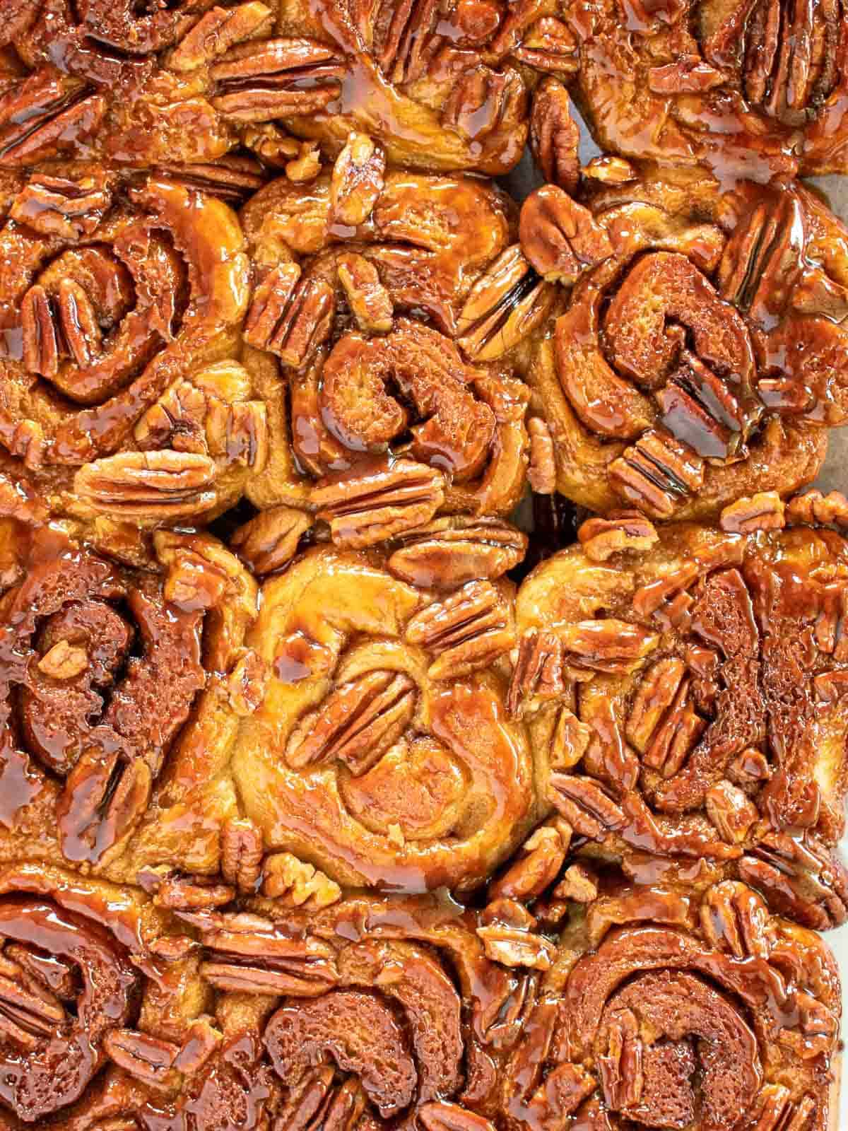 Close up of caramel cinnamon rolls viewed from above.