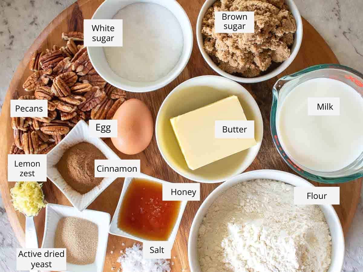 Ingredients required to make the recipe are arranged on wooden board.