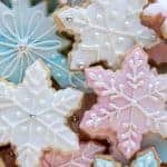 close up of pink, white and blue decorated sugar cookies viewed from above.