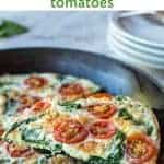 image with text. text reads "egg white frittata with spinach and tomatoes. image is close up of a slice of egg white frittata.