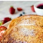 image with text. text reads 'the best ever sourdough french toast". Image is Two slices of sourdough French toast on white plate.