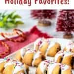 image with text. text is "italian fig cookies cuccidati holiday favorites". Image is seven cookies with slits revealing dark filling drizzled with white icing and colored sprinkles on a white oblong plate.