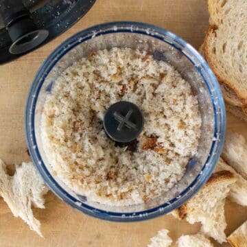 Fresh bread crumbs in a small food processor.
