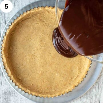 Chocolate ganache being poured into a tart crust.