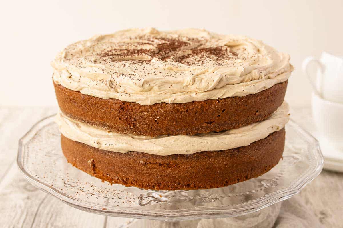 Two layer cake filled and topped with buttercream.