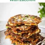 Italian zucchini fritters stacked on top of one another.