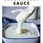 Besciamella sauce pouring off a spoon and into a bowl.