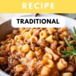 Authentic Italian Pasta e Fagioli Recipe prepared and in a bowl with a spoon.