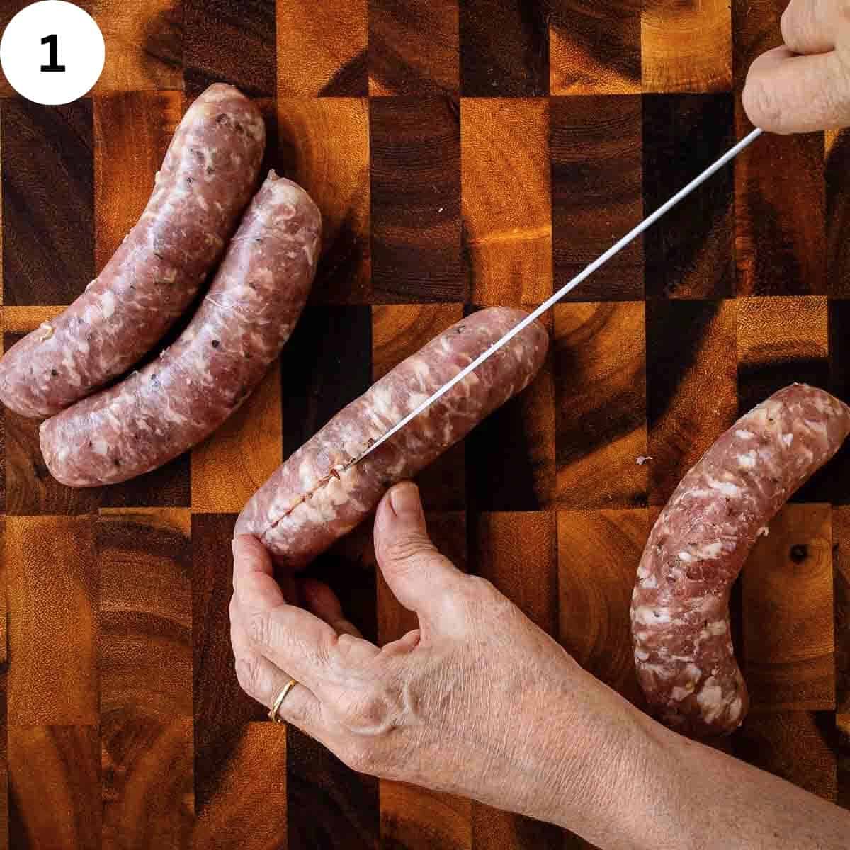 Cutting through an Italian sausage lengthwise.