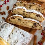 Stollen Bread viewed from above with three slices cut.