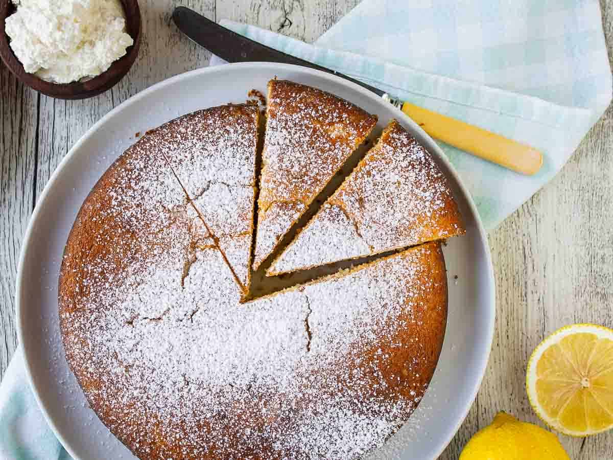 Overhead view of a cake with three wedges cut and slightly moved out from the cake.