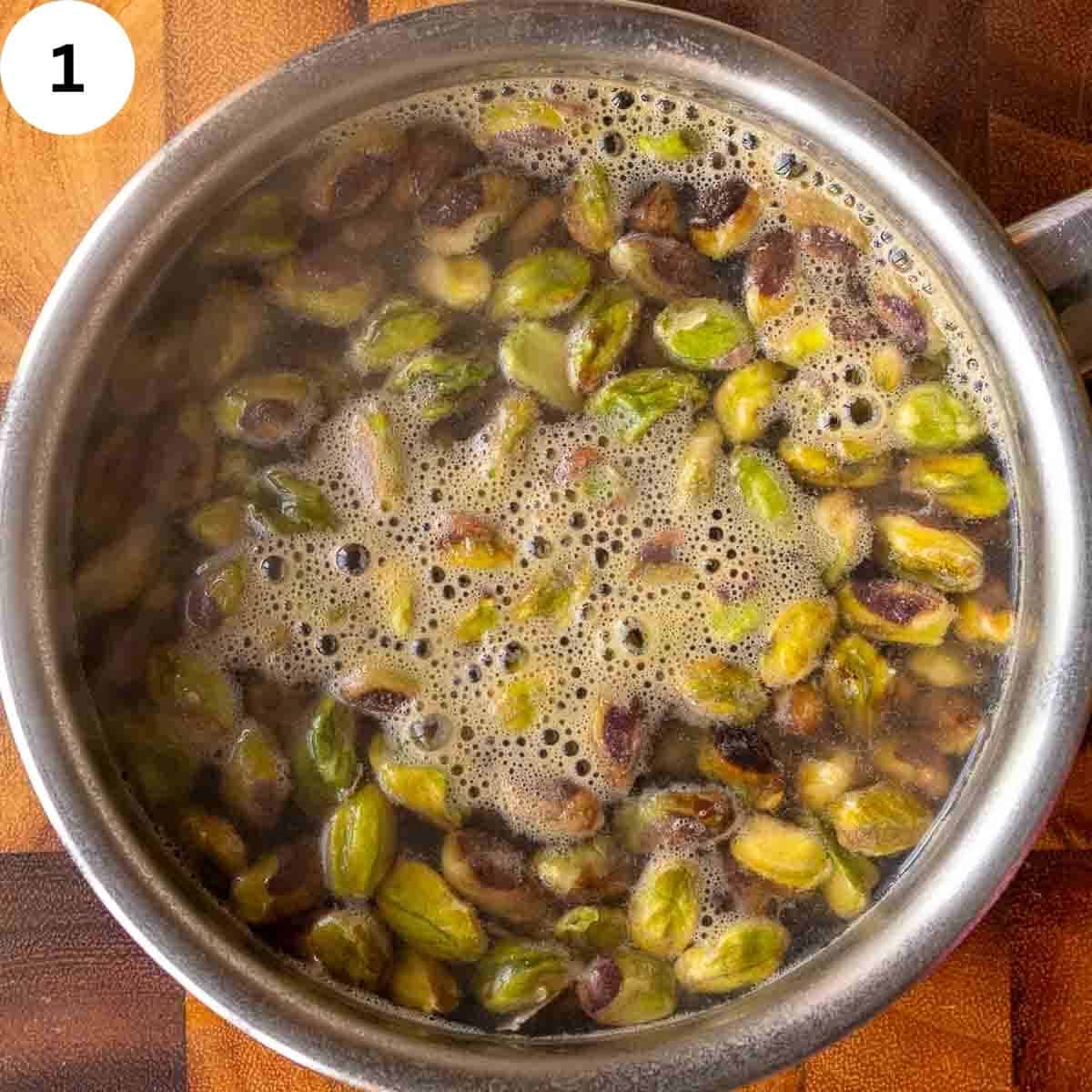 Boiling pistachio nuts.