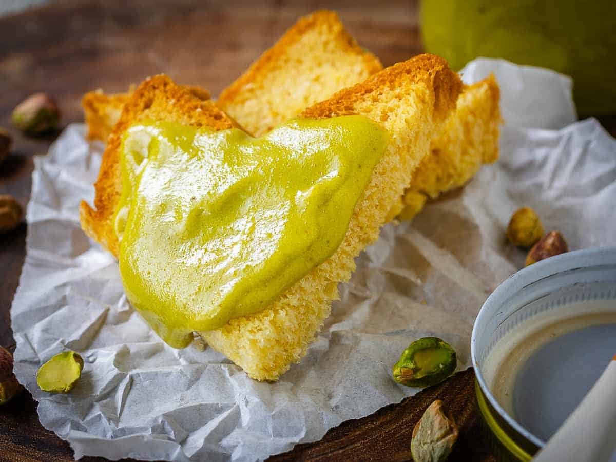 Creamy paste made of pistachio nuts spread on brioche.