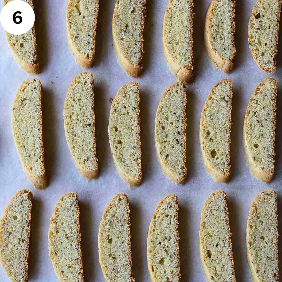 Biscotti arranged on a baking sheet ready for baking.