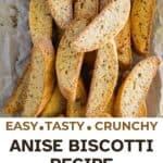 A pile of anise biscotti on parchment paper.