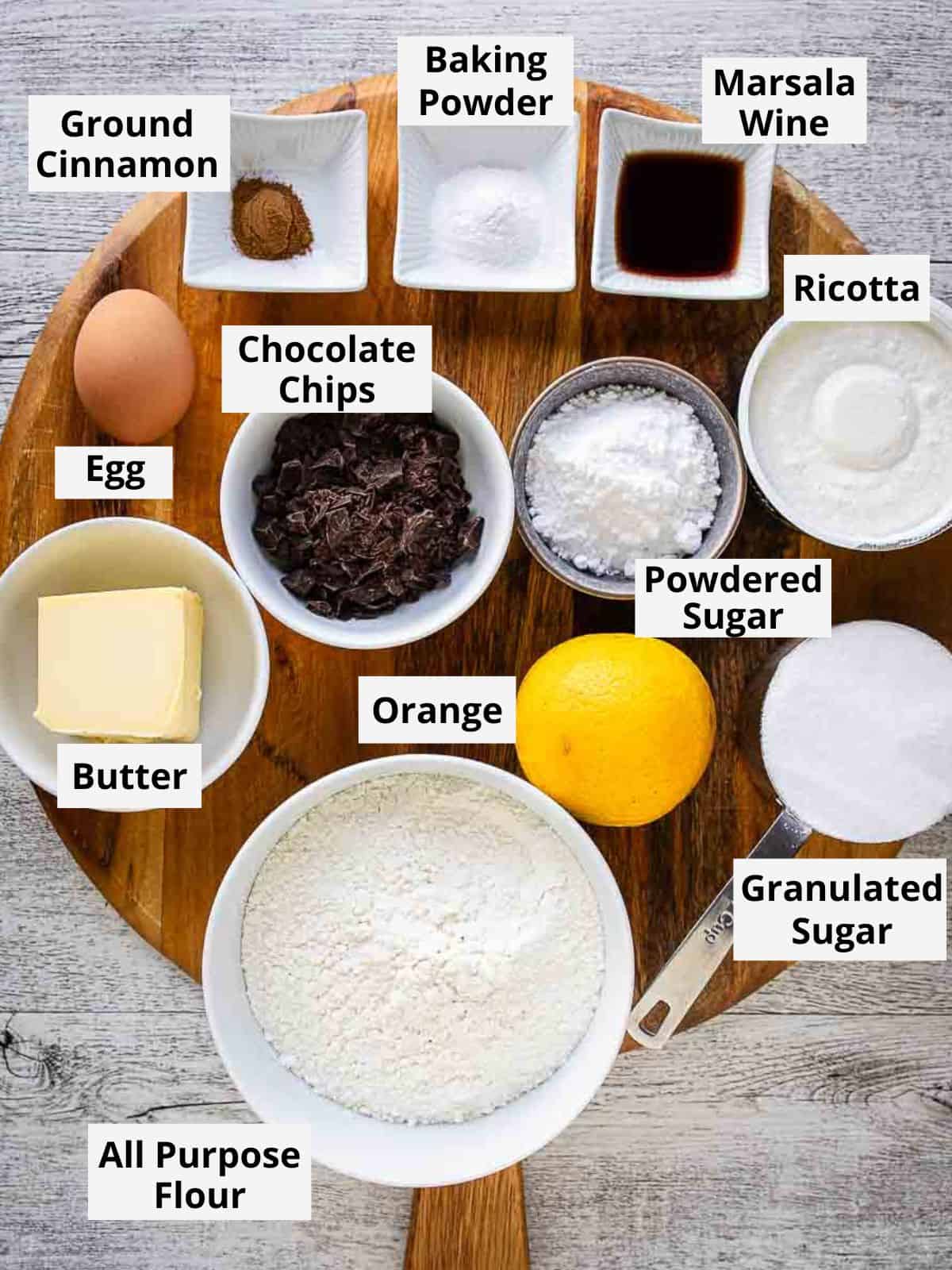 Ingredients for the this recipe on a round wooden board.