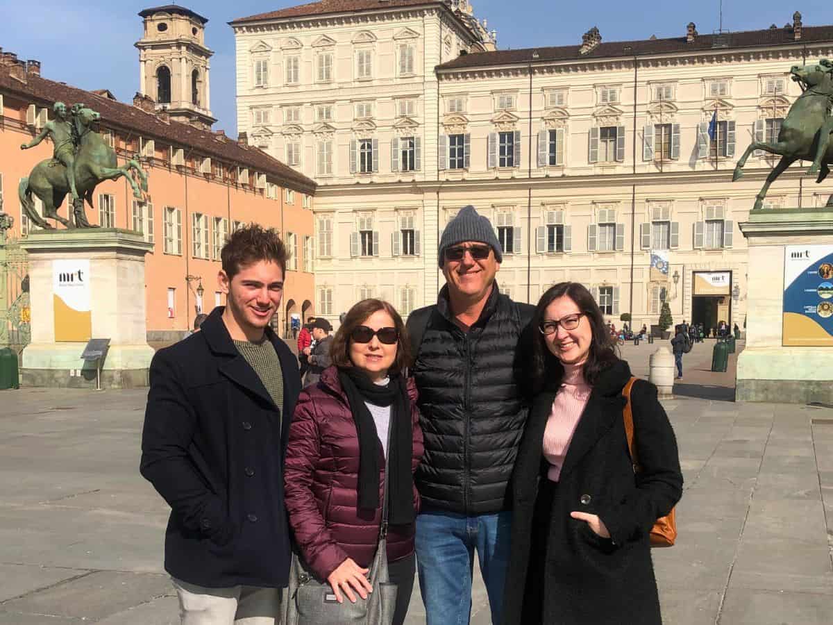 Family of four in Italian city.