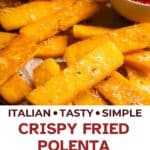 Pile of crispy fried polenta sticks with dipping sauces.