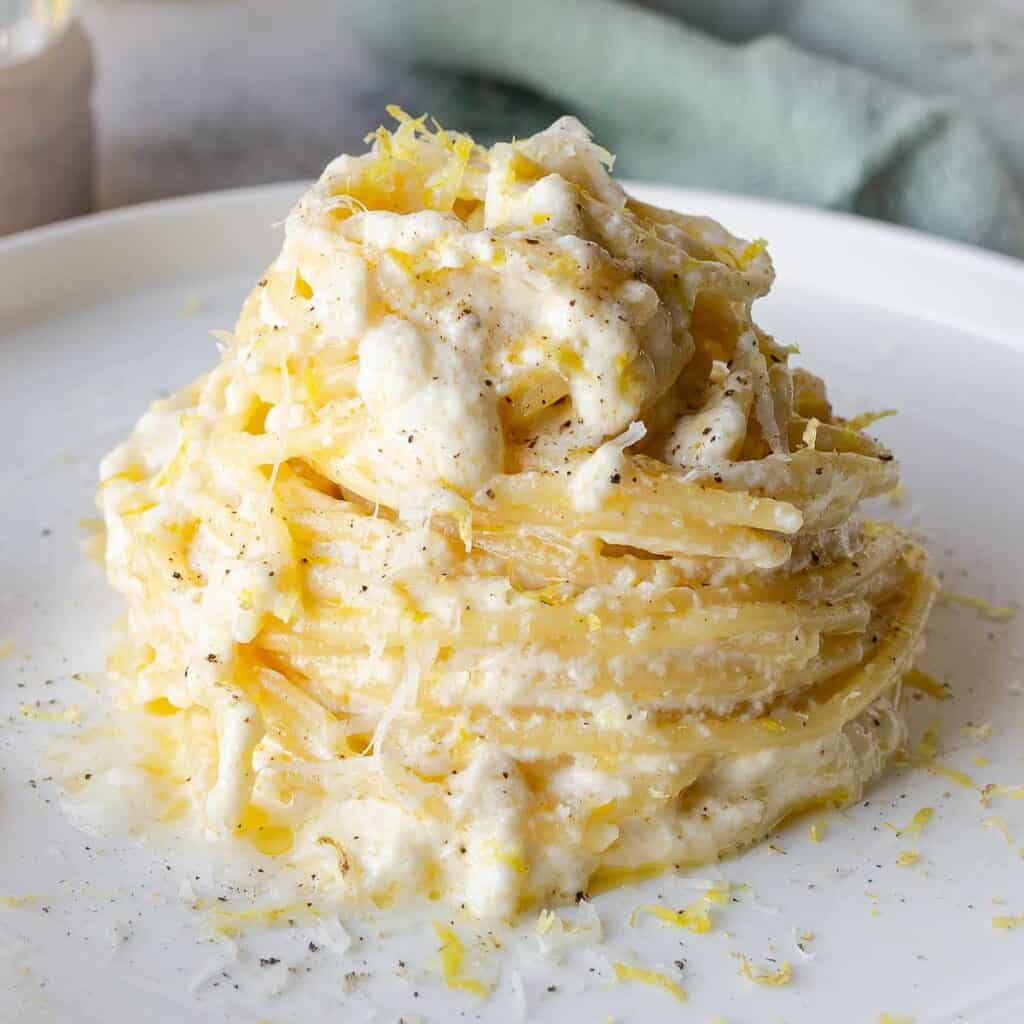 Easy Lemon Ricotta Spaghetti with creamy ricotta cheese, fresh lemon, and Parmigiano Reggiano. Perfect for weeknights.