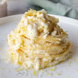 Easy Lemon Ricotta Spaghetti with creamy ricotta cheese, fresh lemon, and Parmigiano Reggiano. Perfect for weeknights.