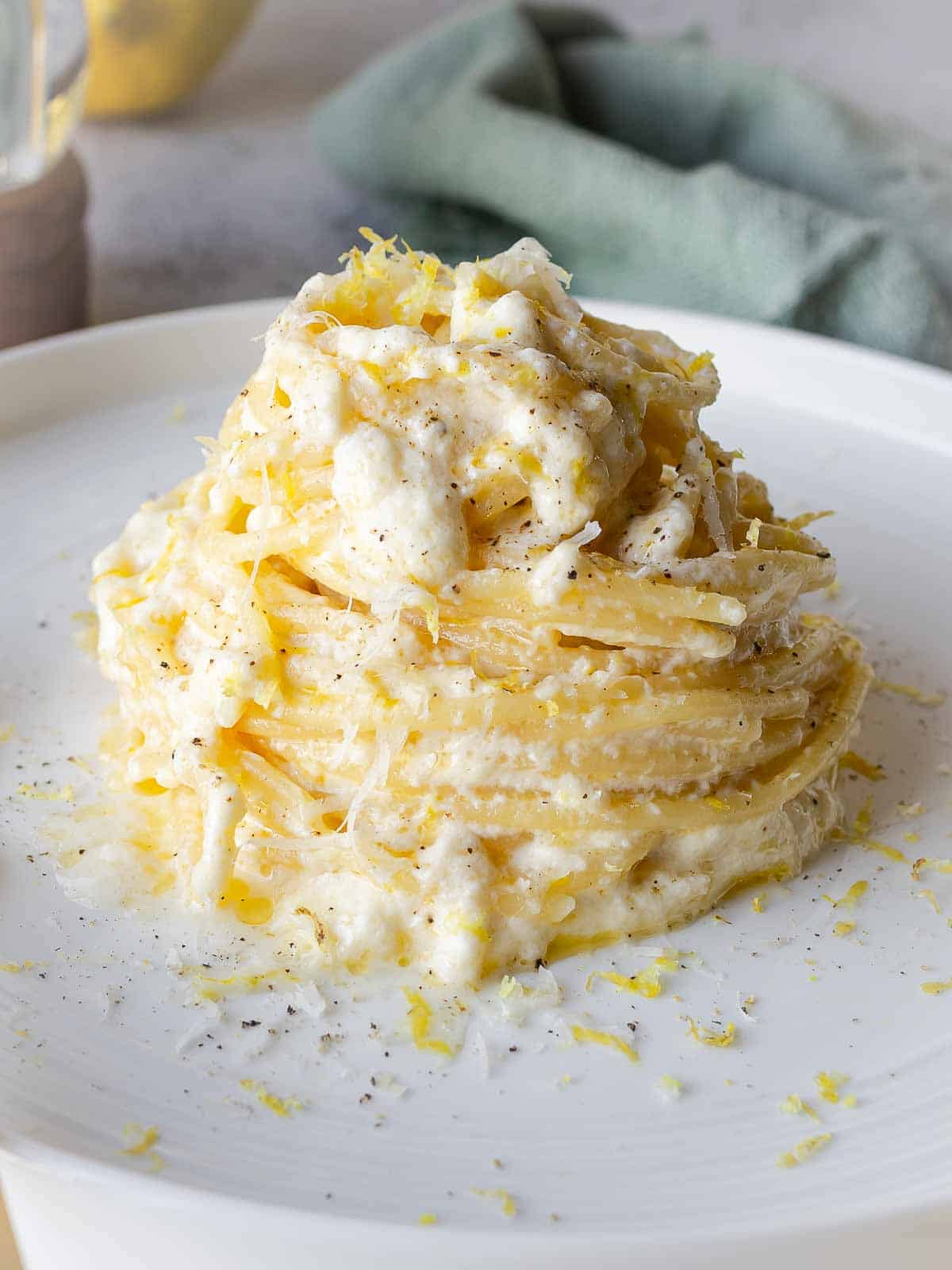 Easy Lemon Ricotta Spaghetti with creamy ricotta cheese, fresh lemon, and Parmigiano Reggiano. Perfect for weeknights.