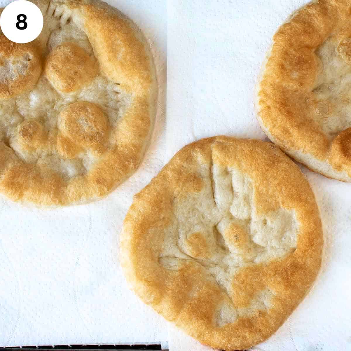 Three small, fried disc of yeasted dough.
